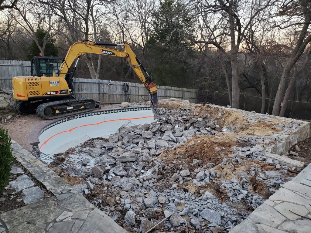 A pool demolition happening at a home in Granbury. 