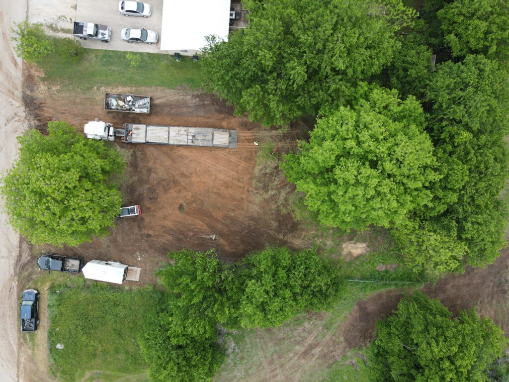 An aerial view of the cleared property after demolition on a home in Granbury, TX that was a complete loss from a house fire.