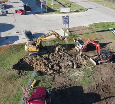 Wannco Services demolition company excavating rock on a property in Fort Worth